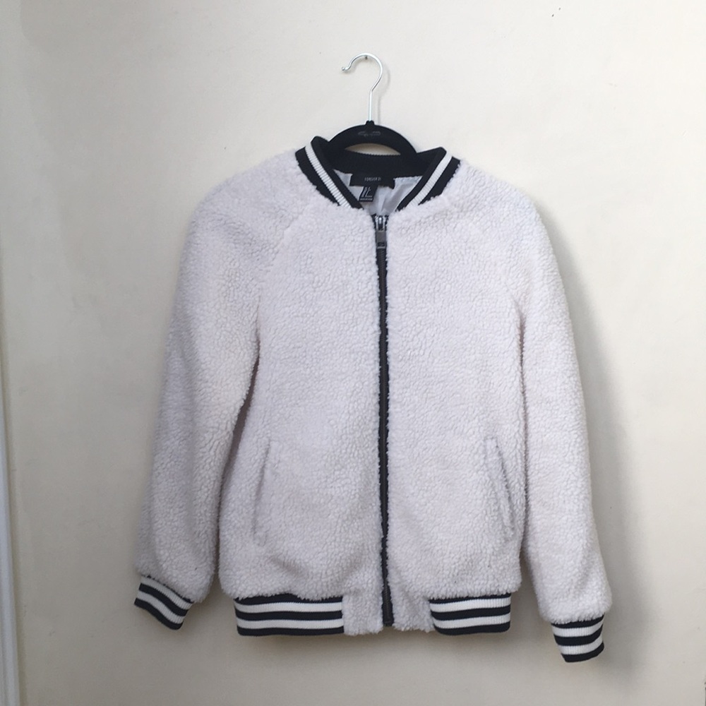Zip up black and white fuzzy bomber jacket